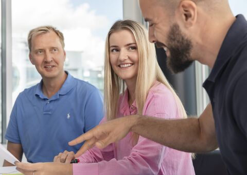 Office workers chatting.